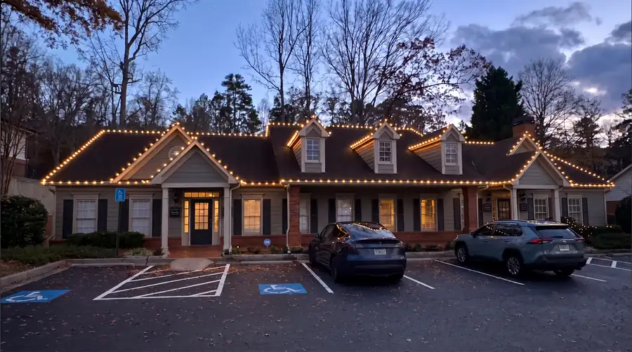 Office and professional property holiday lighting with roofline lights and entry visibility